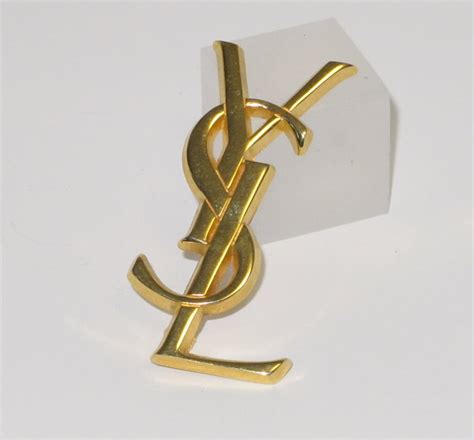 authentic ysl brooch|YSL brooch men.